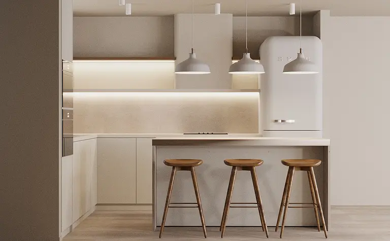 Kuchnia w stylu japandi i minimalistycznym z białymi meblami i drewnianymi elementami.