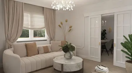 Wnętrze salonu w stylu art deco z beżową sofą i białym stolikiem.