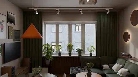 Wnętrze salonu eklektycznego z zieloną sofą i pomarańczowym lampionem.