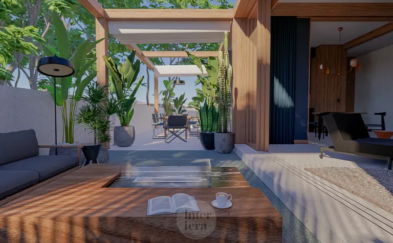 Eklektyczny taras z drewnianym stołem, roślinami i lampą.