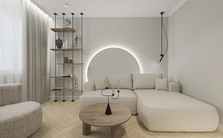 Salon w stylu soft minimalizm z jasną sofą i drewnianym blatem.