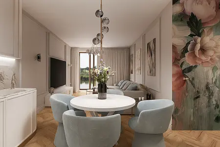 Wnętrze salonu z szarymi fotelami i białymi meblami w stylu nowoczesnym i quiet luxury.