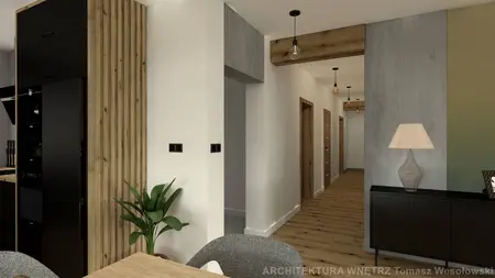 Wnętrze kuchni z czarnymi meblami i drewnianymi akcentami, styl industrialny.