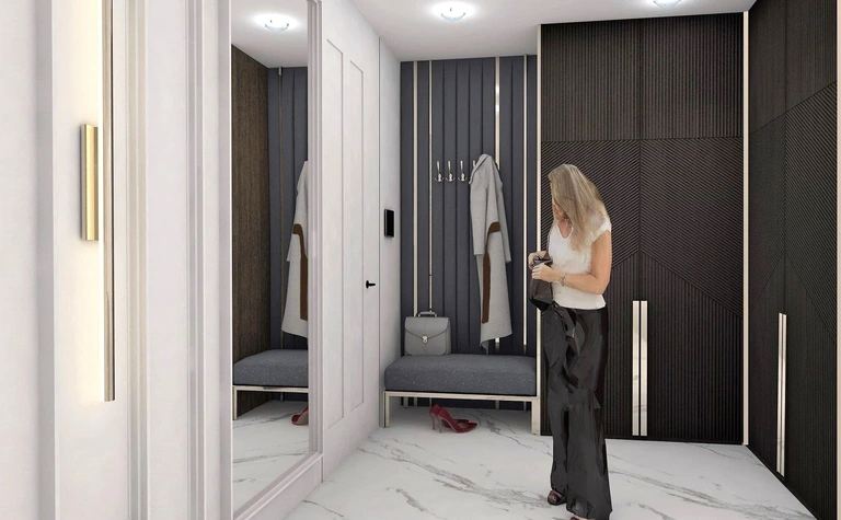 Przedpokój w stylu glamour z białymi meblami i czarnymi detalami.