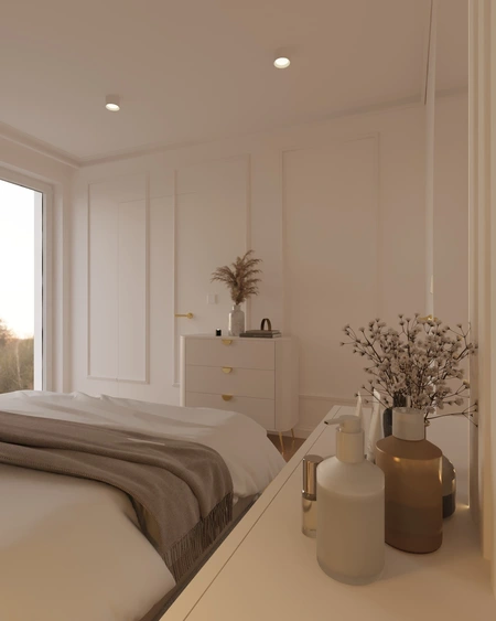 Sypialnia w stylu quiet luxury z jasnymi meblami i dekoracjami.