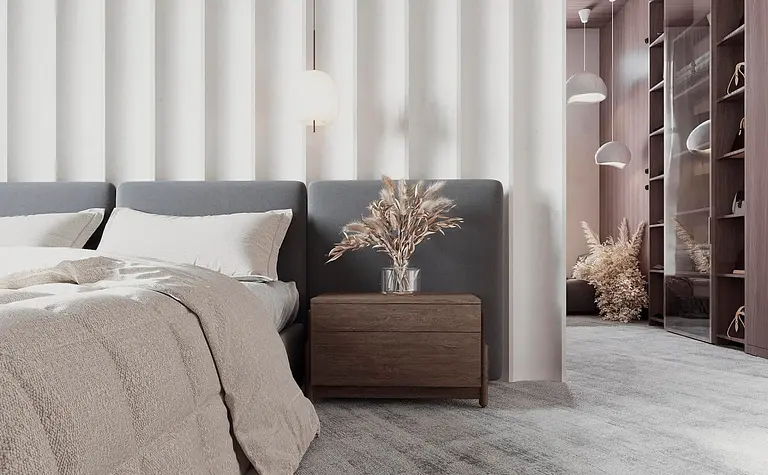 Wnętrze sypialni z szarym łóżkiem, minimalistycznym designem i nowoczesnymi akcentami.