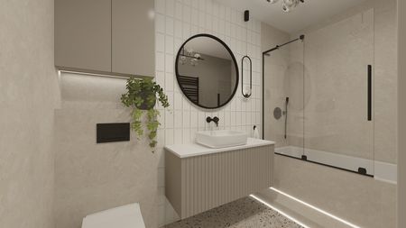 Wnętrze łazienki z umywalką, lustrem i rośliną w stylu japandi.