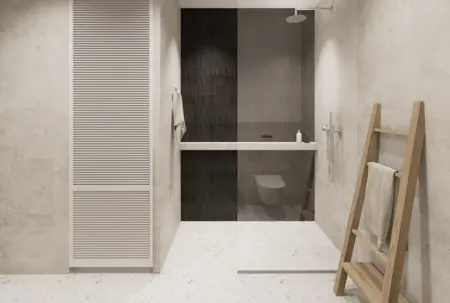 Nowoczesna łazienka w stylu japandi i minimalistycznym z szarymi płytkami.