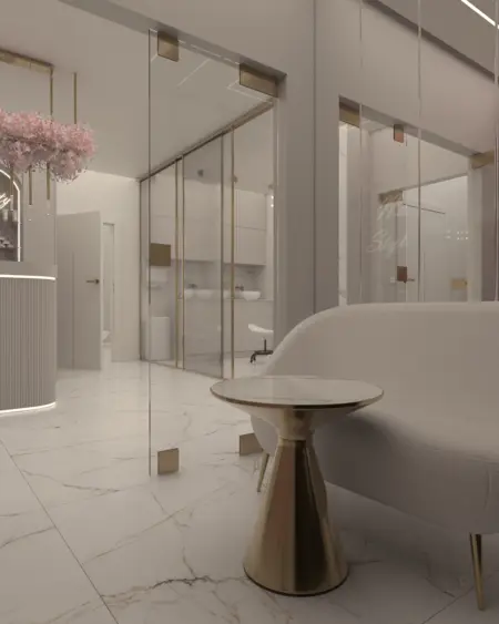 Nowoczesne wnętrze glamour z jasnymi meblami i złotymi detalami.