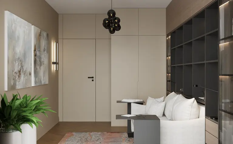 Minimalistyczne wnętrze z jasnymi meblami i ciemnymi detalami.