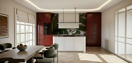 Wnętrze kuchni z białymi meblami, czerwonymi akcentami oraz zielonymi roślinami, eklektyczny styl.