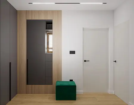 Przedpokój w stylu minimalistycznym z szafą i zielonym siedziskiem.