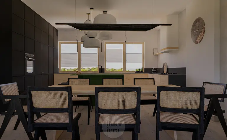 Kuchnia w stylu japandi i minimalistycznym z czarnymi meblami i drewnianym stołem.