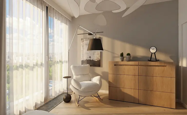 Minimalistyczne wnętrze pokoju z białym fotelem i drewnianą komodą.