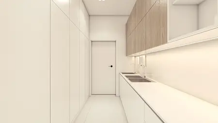 Kuchnia w stylu minimalistycznym z białymi meblami i drewnianymi detalami.