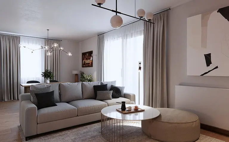 Wnętrze salonu w stylu eklektycznym i minimalistycznym z jasnymi zasłonami oraz nowoczesnym oświetleniem.