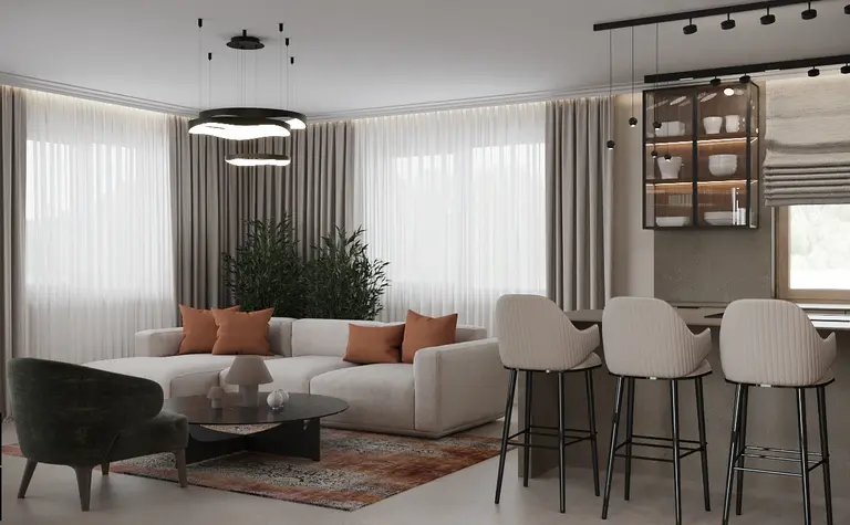 Wnętrze salonu w stylu minimalistycznym z jasnymi meblami i roślinami.