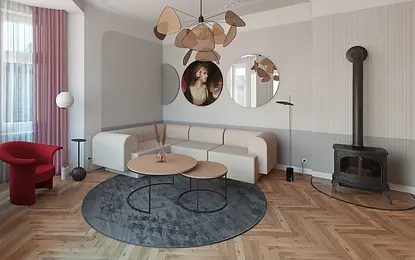 Wnętrze salonu w stylu dopamine decor z jasną sofą, drewnianym stolikiem i okrągłym dywanem.