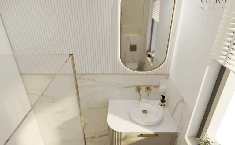 Nowoczesna łazienka w stylu art deco, glamour i minimalistycznym z białą umywalką.