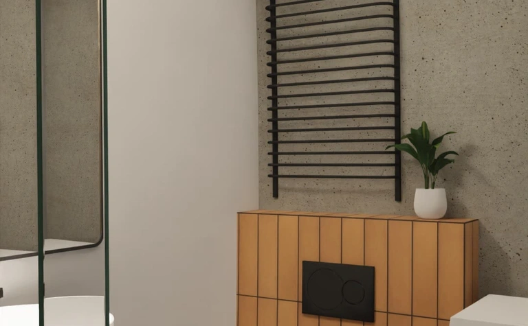 Wnętrze łazienki z minimalistycznym designem, białą toaletą i brązowymi detalami.