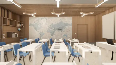 Wnętrze klasy z białymi biurkami, niebieskimi krzesłami i mapą świata na ścianie, minimalistyczny projekt