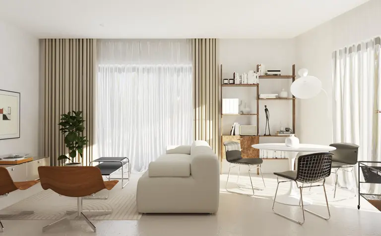 Wnętrze salonu w stylu nowoczesnym, soft minimalizm i vintage z białą sofą i drewnianymi detalami.