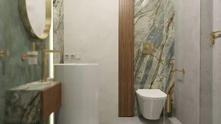 Wnętrze łazienki z marmurowymi ścianami, białą umywalką i złotymi dodatkami w stylu minimaluxe.