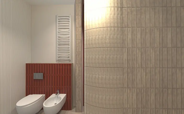 Wnętrze łazienki z beżowymi kafelkami, białymi toaletami i eklektycznymi akcentami.