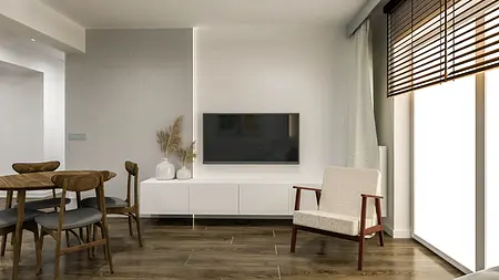 Wnętrze salonu z minimalistycznym wystrojem, drewnianym stołem, telewizorem i roślinami.