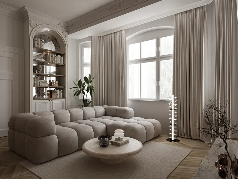 Eklektyczny salon z beżową sofą, drewnianym stolikiem i rośliną.