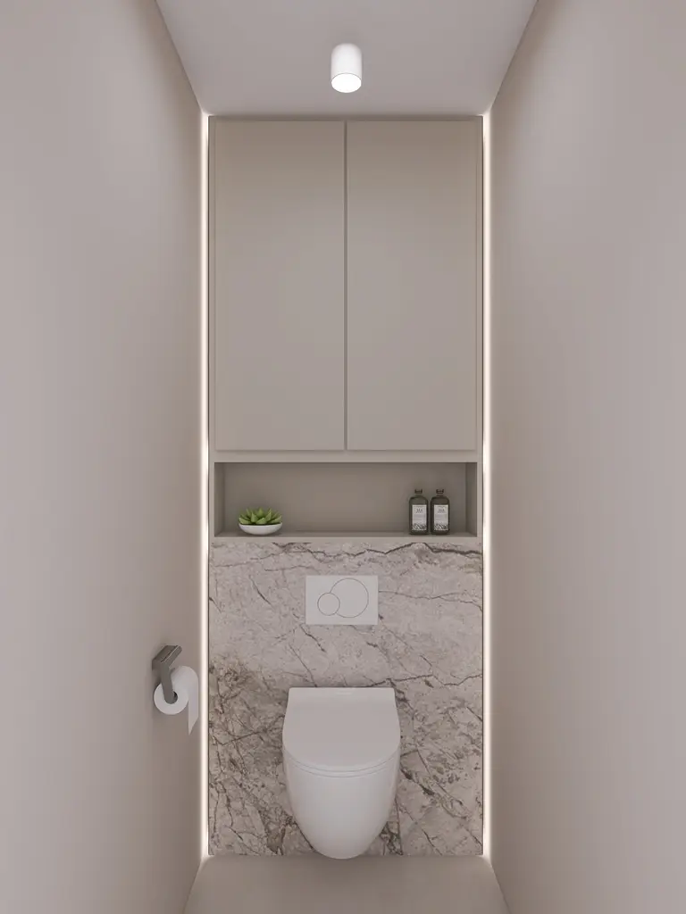 Minimalistyczna toaleta z nowoczesną białą ceramiką i współczesnym wykończeniem.