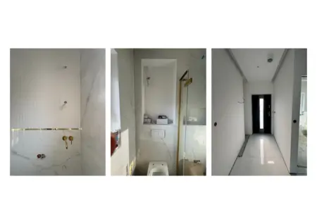 Nowoczesna łazienka z białymi kaflami, złotymi detalami, styl art deco, glamour, minimalistyczny.
