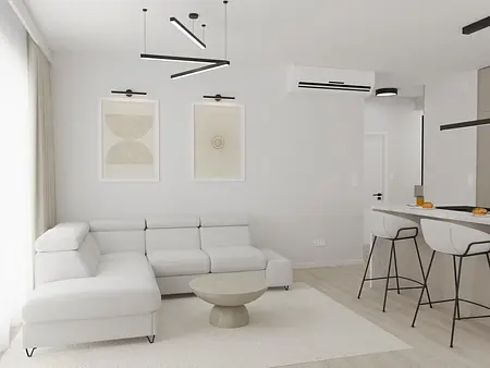 Wnętrze nowoczesnego salonu z białą sofą, minimalistycznymi akcentami i jasnymi kolorami.