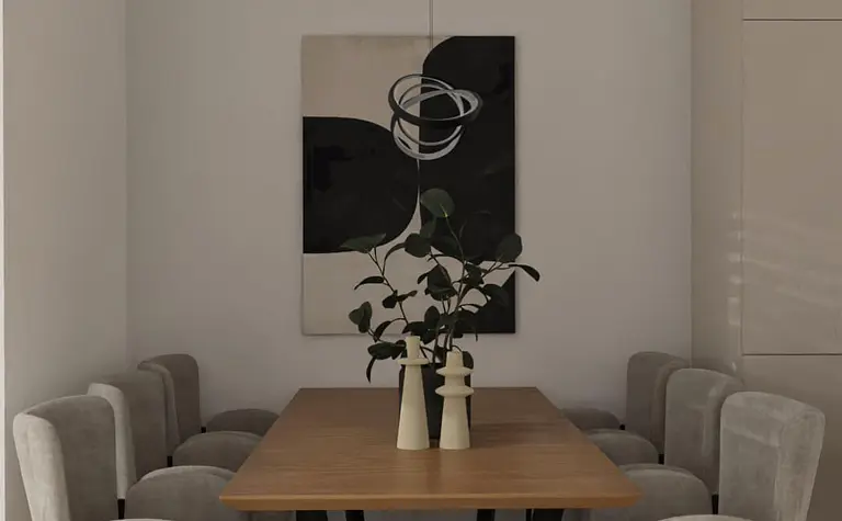 Elegancka jadalnia z drewnianym stołem, szarymi tapicerowanymi krzesłami i minimalistyczną lampą wiszącą nad stołem.