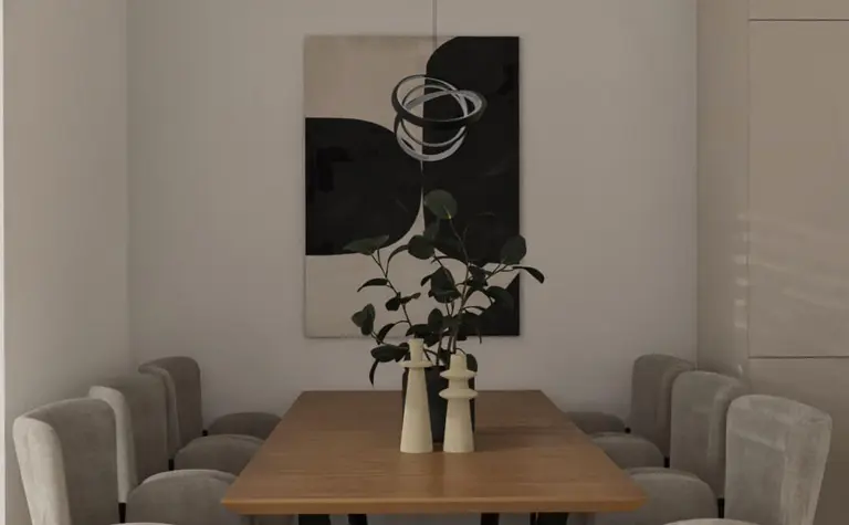 Elegancka jadalnia z drewnianym stołem, szarymi tapicerowanymi krzesłami i minimalistyczną lampą wiszącą nad stołem.