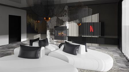 Nowoczesny salon z białymi meblami, kominkiem i dekoracyjnym oświetleniem.