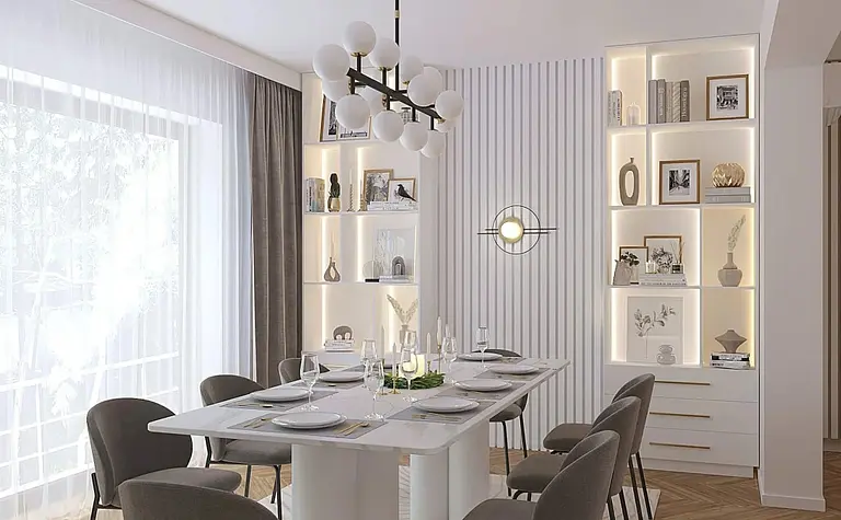 Wnętrze jadalni z białym stołem, szarymi krzesłami i nowoczesnymi lampami.