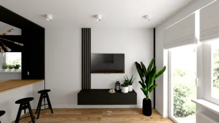 Nowoczesny salon z rośliną, czarną szafką i drewnianym blatem. Styl minimalistyczny.