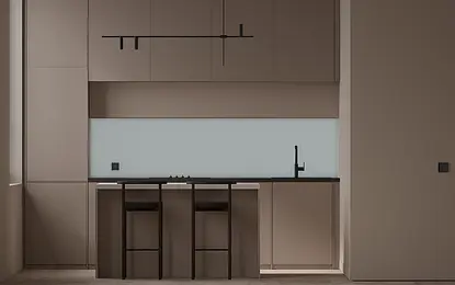 Kuchnia z brązowymi meblami, szarym blatem i nowoczesnym wykończeniem