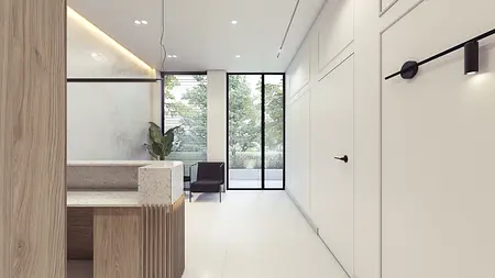 Przedpokój w stylu minimalistycznym z drewnianą ladą i dużymi oknami.