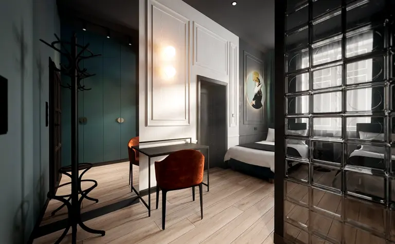 Wnętrze z art deco, dopamine decor i eklektycznym stylem, brązowy fotel, niebieska szafa.