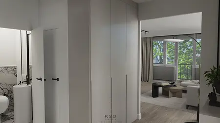 Nowoczesne wnętrze z białymi meblami i szarymi detalami, okna z widokiem na zewnątrz.