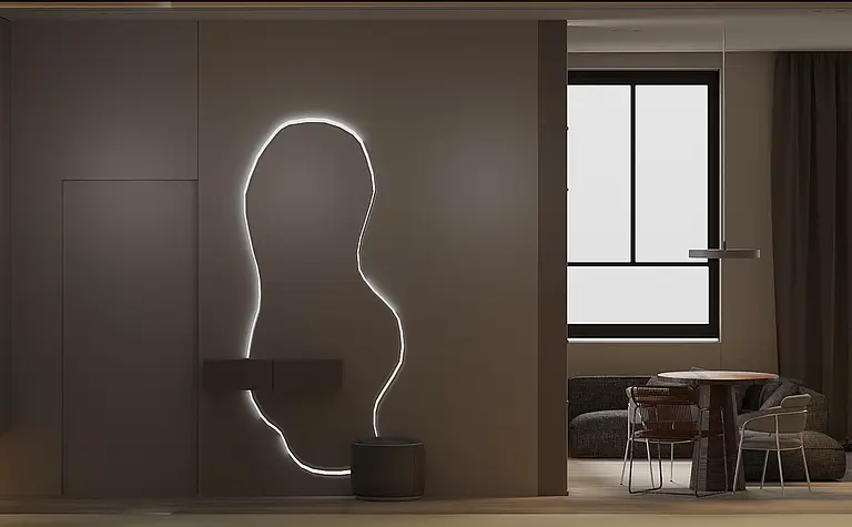 Wnętrze z nowoczesnym oświetleniem, drewnianym stołem i sofą w stonowanych kolorach.