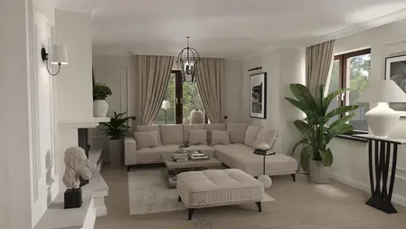 Wnętrze salonu z beżową sofą, kwiatami i lampą w stylu quiet luxury.