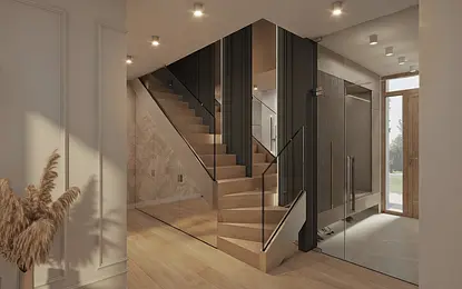 Wnętrze przedpokoju z drewnianymi schodami i szklanymi akcentami w stylu glamour.