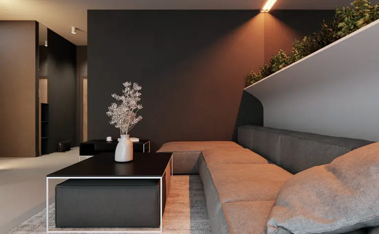 Wnętrze salonu w stylu eklektycznym, minimalistycznym i soft minimalizm z szarymi ścianami.