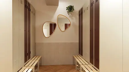 Garderoba w stylu industrialnym z minimalistycznymi szafkami i skandynawskimi lustrami.