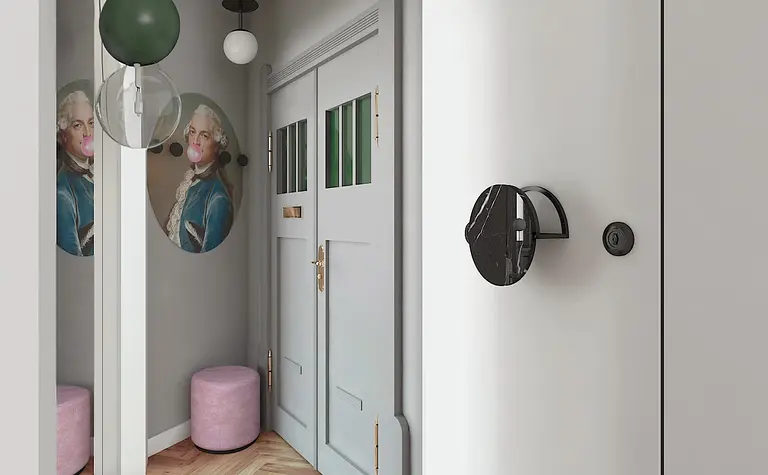 Przedpokój z różowym stołkiem, szarymi ścianami i grafiką dopamine decor.