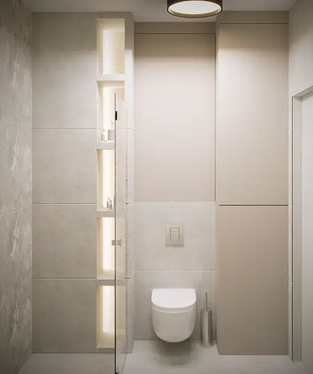 Nowoczesna łazienka z minimalistycznymi detalami i szarymi płytkami.