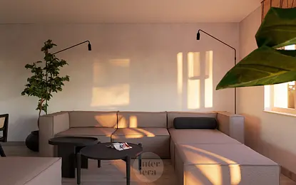 Salon w stylu japandi i minimalistycznym z szarym narożnikiem i rośliną